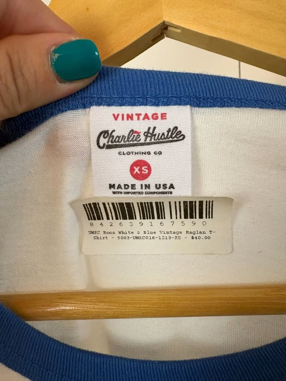 Charlie Hustle UMKC Blue and White Raglan Long Sleeve Tee with Yellow Graphic
